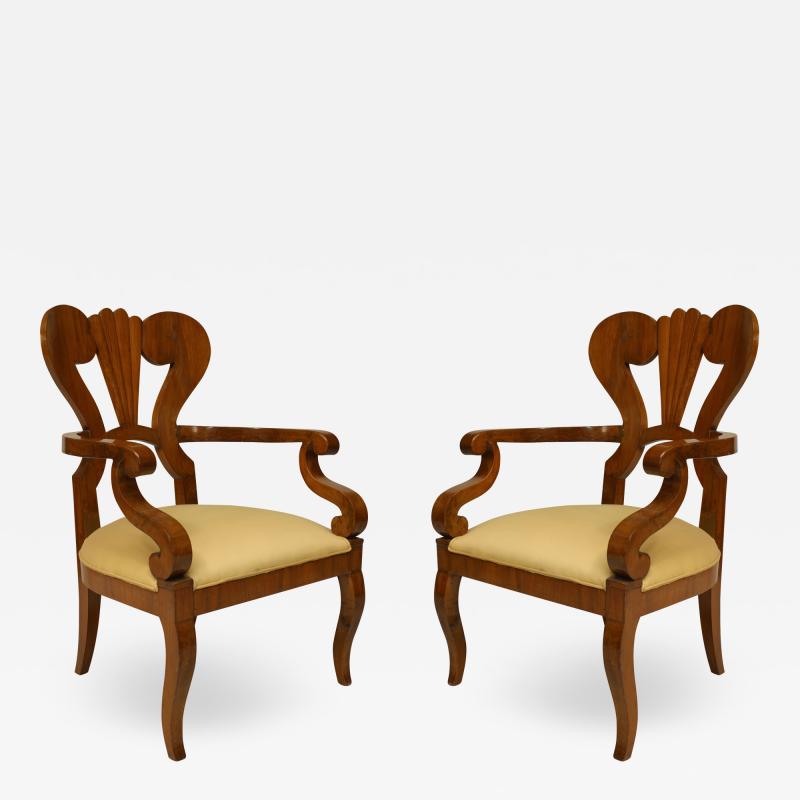 Pair of Austrian Biedermeier Cherrywood Arm Chairs