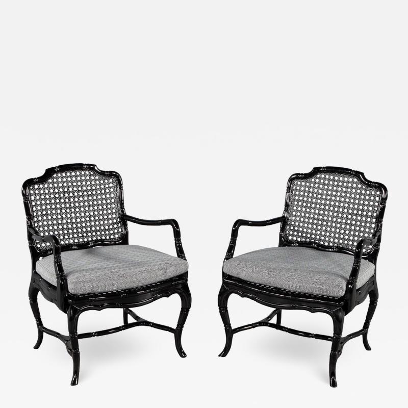 Pair of Black Lacquered Cane Back Lounge Chairs