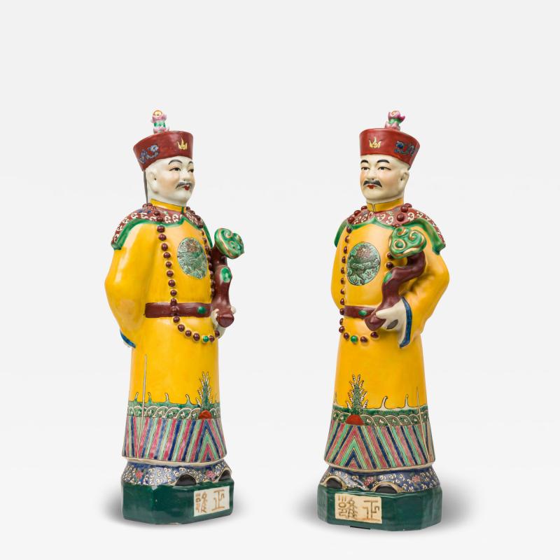 Pair of Chinese Painted Ceramic Figures Depicting a Yellow Robed Emperor