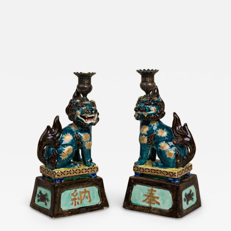 Pair of Chinese Style Decorative Porcelain Foo Dog Candlesticks