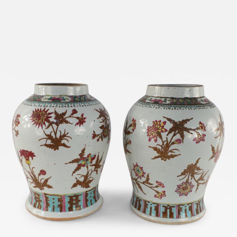Pair of Chinese White and Maroon Floral Motif Porcelain Vases