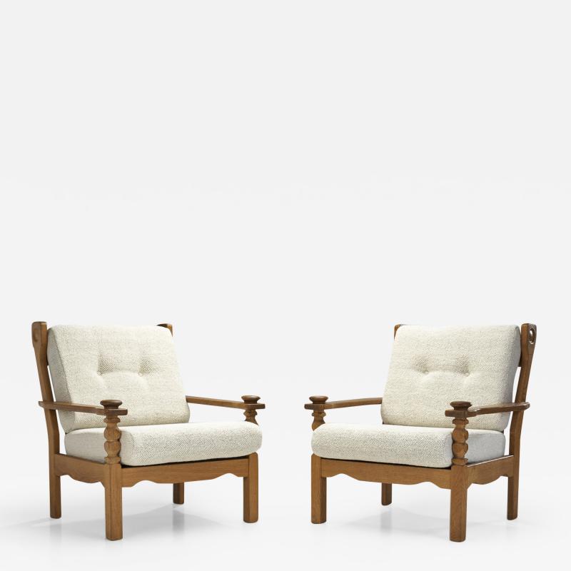 Pair of Danish Oak Easy Chairs with Carved Arm Supports Denmark ca 1950s