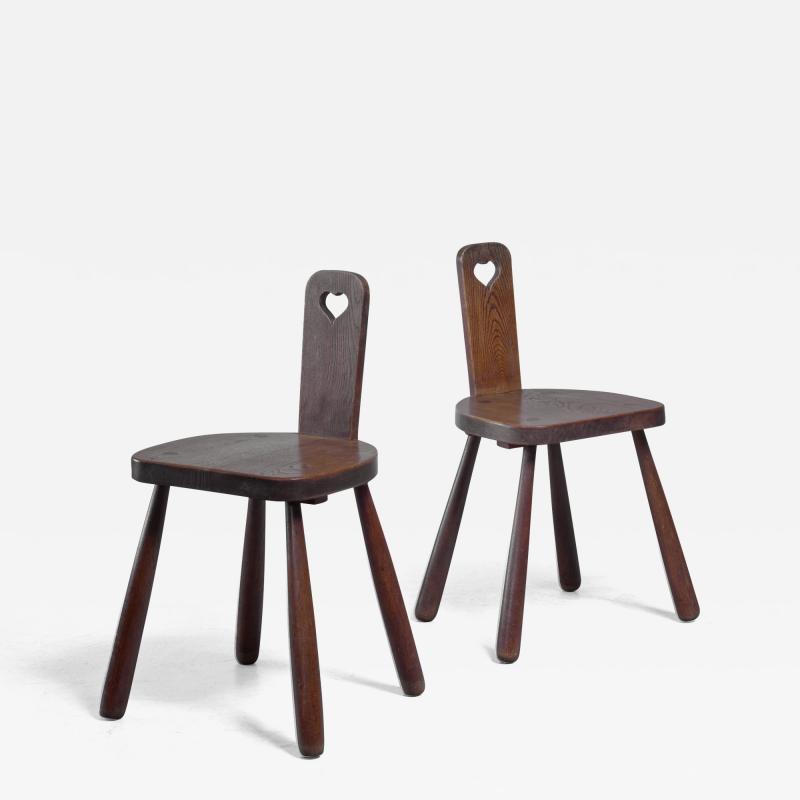 Pair of Danish folk art chairs oak with round tapered legs