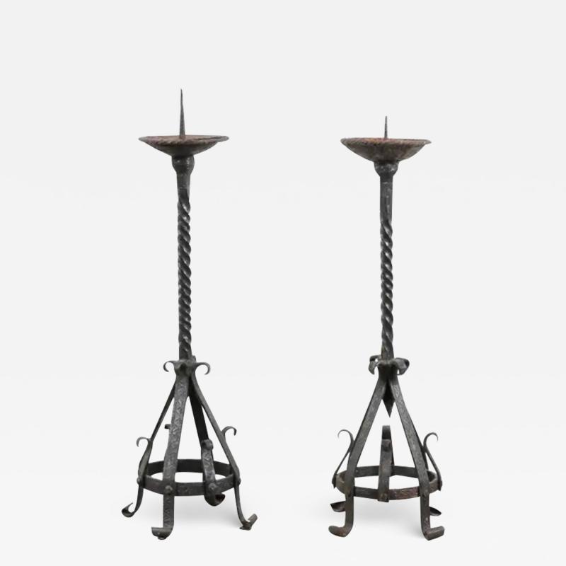 Pair of English 19th Century Iron Candlesticks with Twisted and Scrolled Motifs