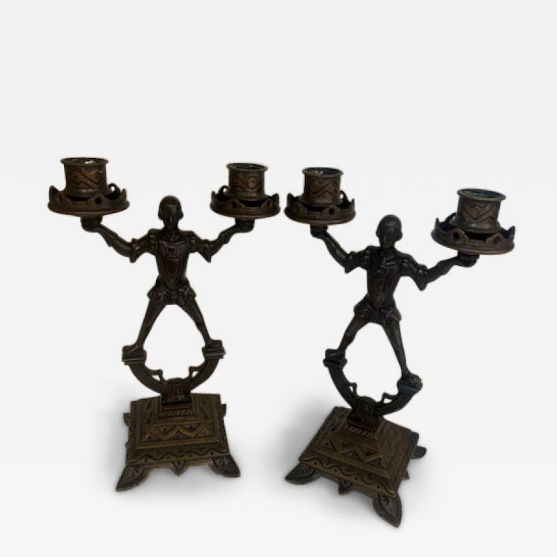 Pair of English 2 arm candlesticks held by a Renaissance style figure