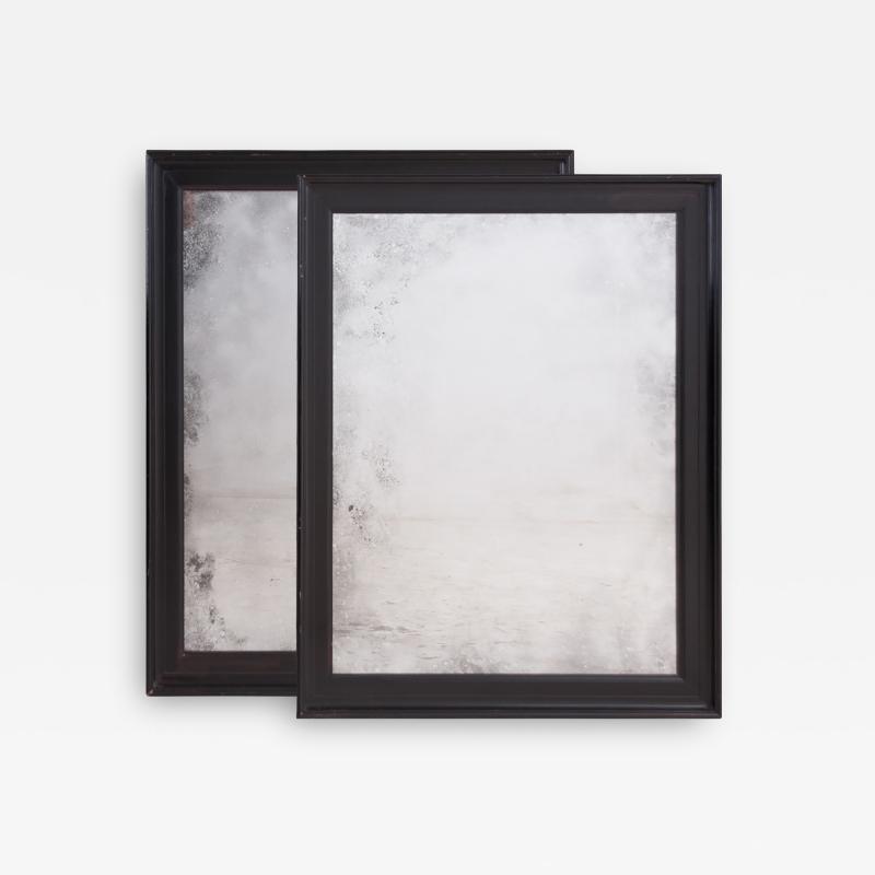 Pair of English 20th Century Ebonized Mirrors
