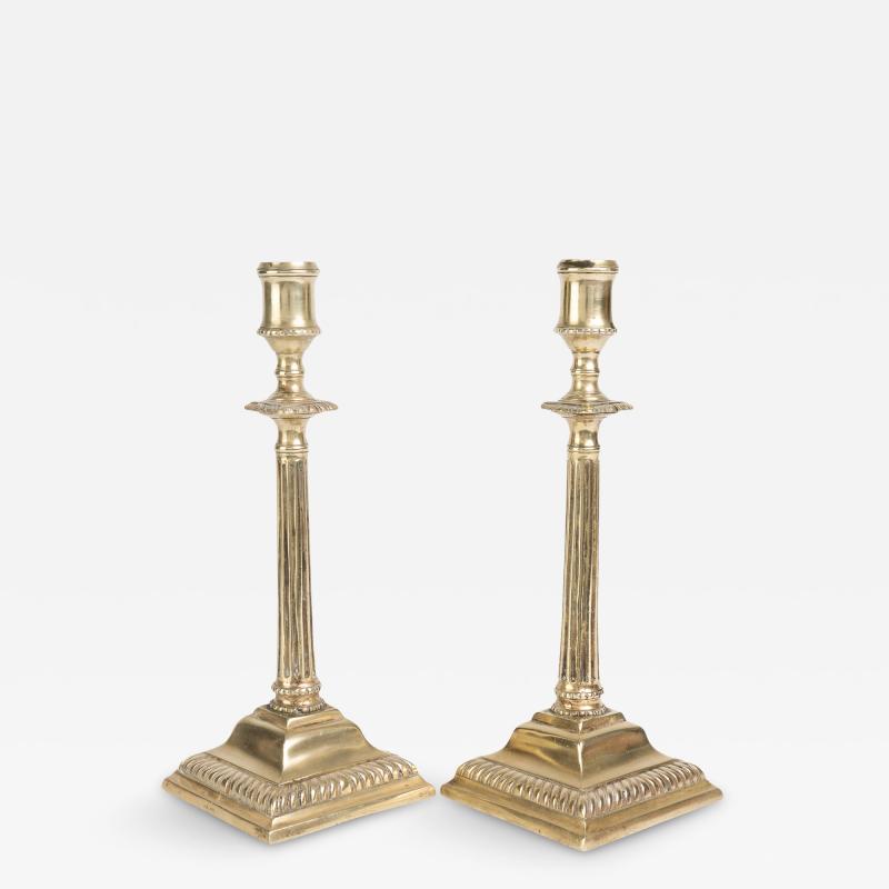 Pair of English Georgian cast brass fluted shaft candlesticks 1760