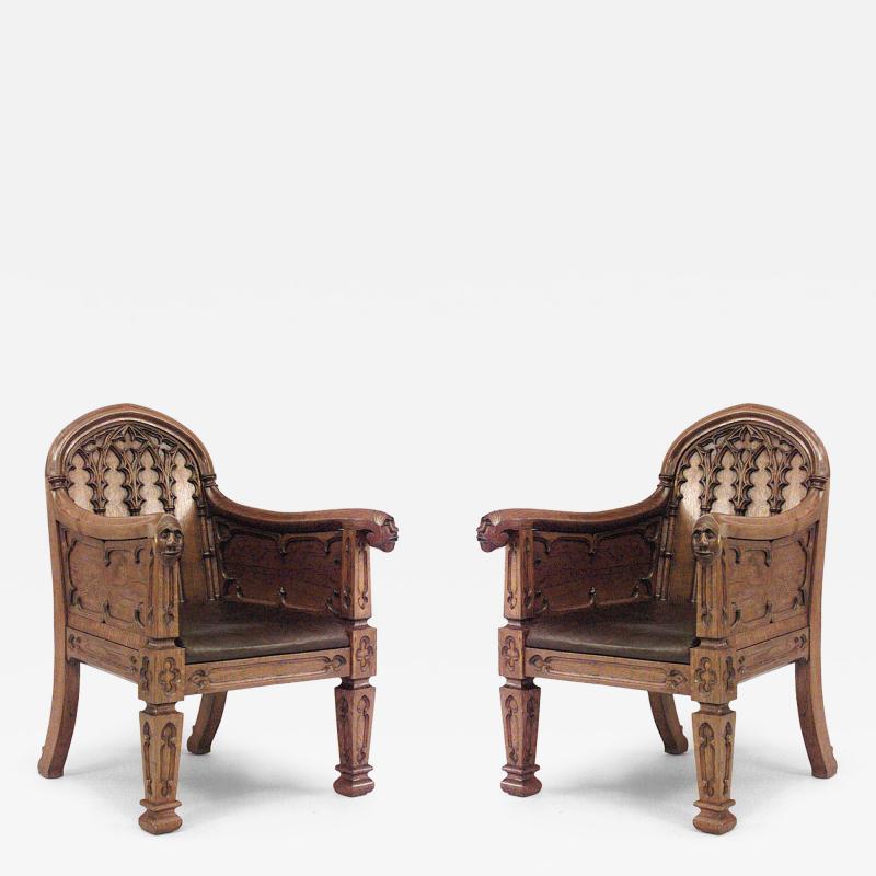 Pair of English Gothic Revival 19th Century oak carved club chairs