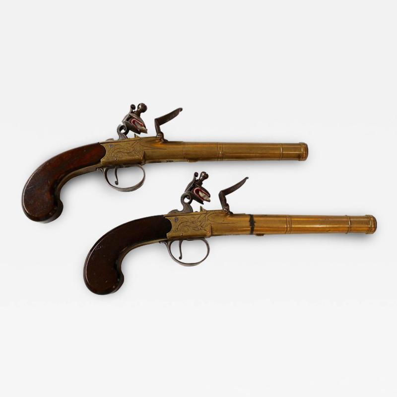 Pair of English Queen Anne Brass Pistols