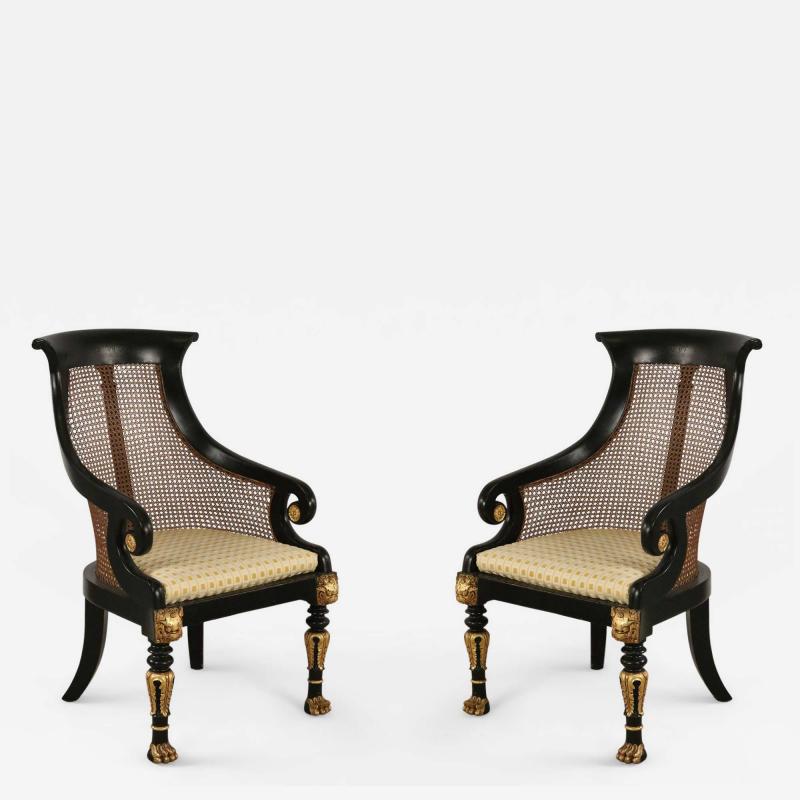 Pair of English Regency Style Carved Black and Giltwood Cane Back Armchairs