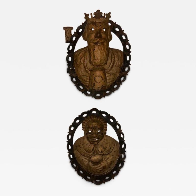 Pair of English Renaissance style metal wall plaques of king and lady