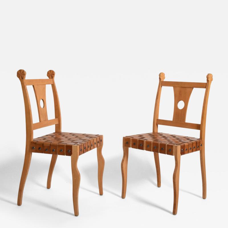 Pair of Etruscan oak and leather chairs 1970s 