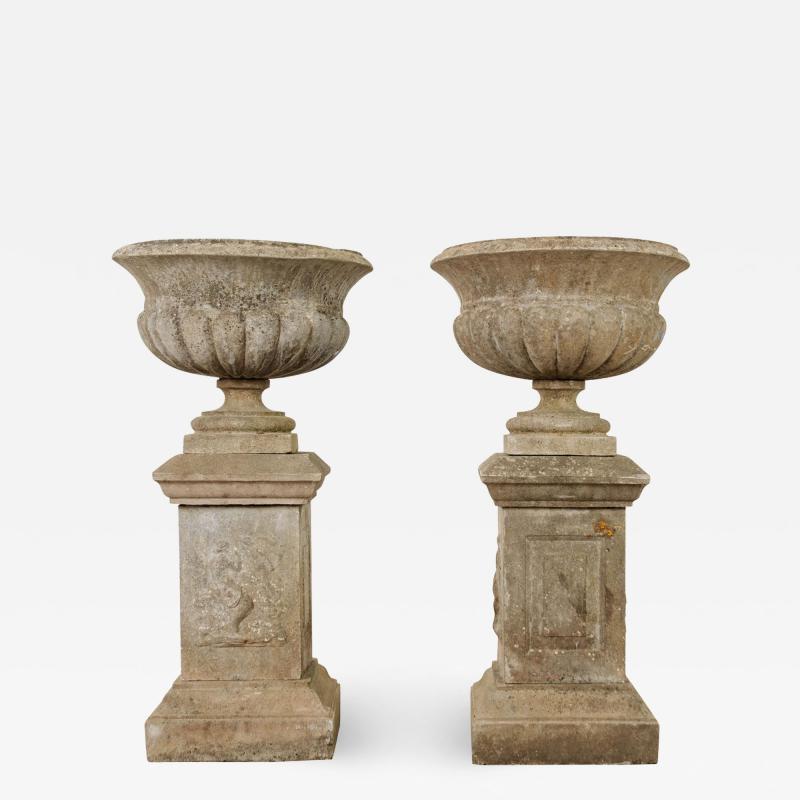 Pair of French 19th Century Cast Stone Urns on Pedestals