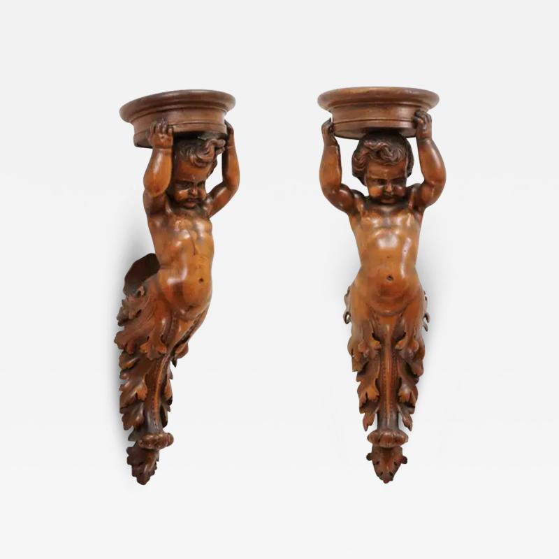 Pair of French Baroque Style 1810s Walnut Wall Sconces with Carved Putti