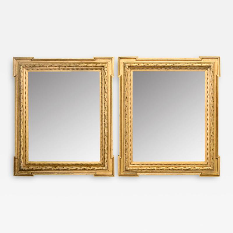 Pair of French Carved Gold Gilt Mirrors