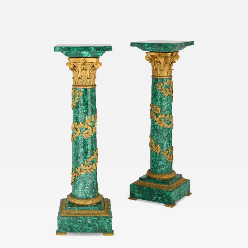 Pair of French Empire style malachite and gilt bronze pedestals