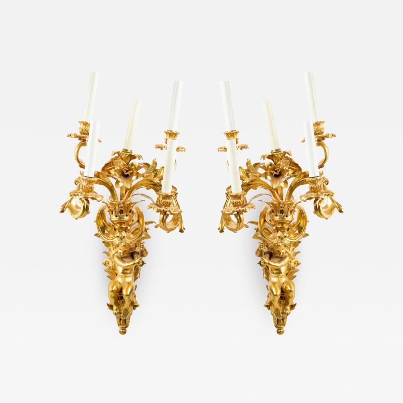 Pair of French Louis XV Style Bronze Dore Cupid Wall Sconces