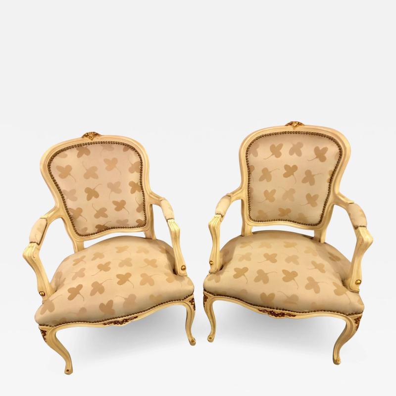 Pair of French Louis XV Style Parcel Gilt and Paint Decorated Bergere Chairs