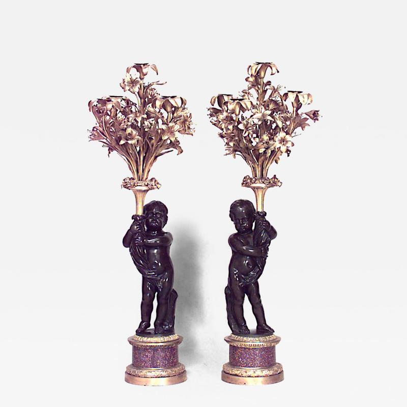 Pair of French Louis XVI Style Bronze Cupid Candelabras