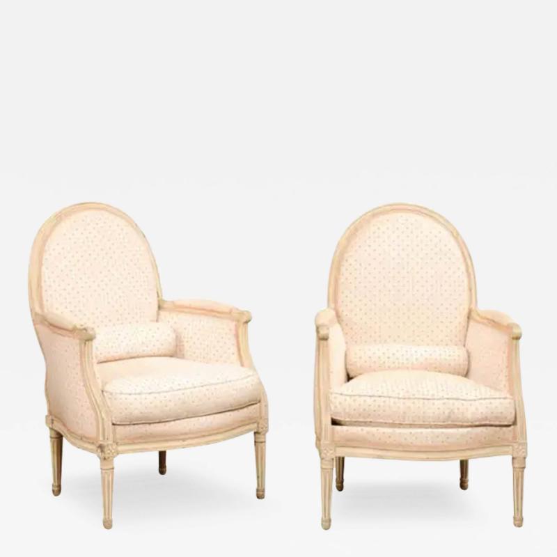 Pair of French Louis XVI Style Painted Berg res Chairs with Oval Shaped Backs