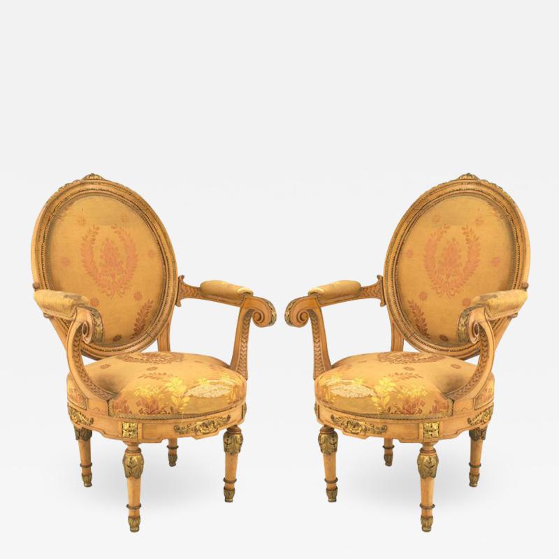 Pair of French Louis XVI Yellow Silk Arm Chairs