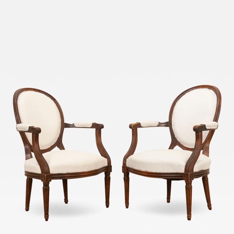 Pair of French Oak Louis XVI Style Fauteuils