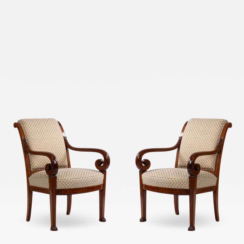 Pair of French Restoration Mahogany Arm Chairs