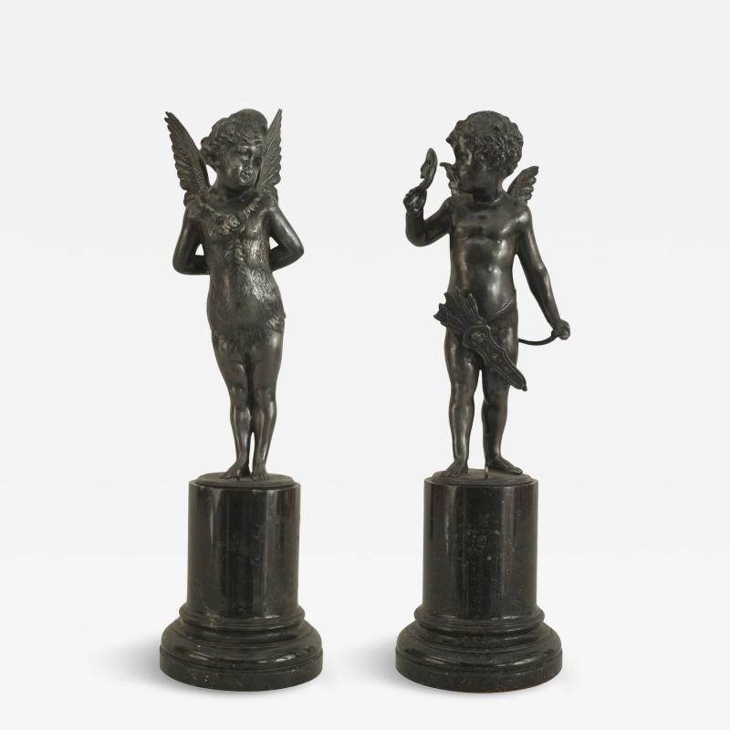 Pair of French Victorian Silver Cupid Figures