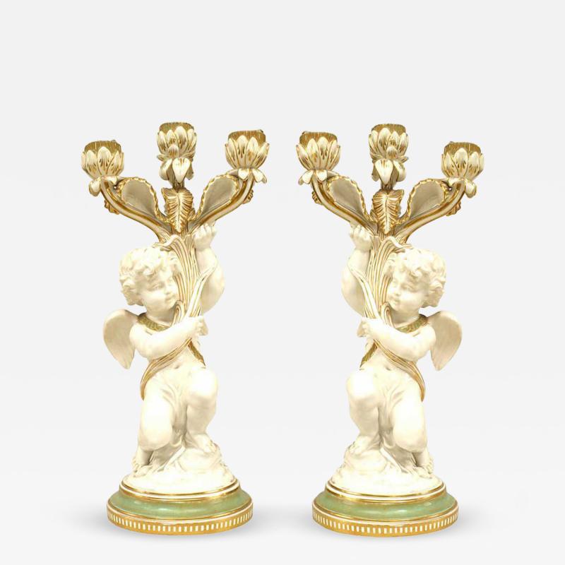 Pair of French Victorian White and Gilt Porcelain Cupid Candelabras