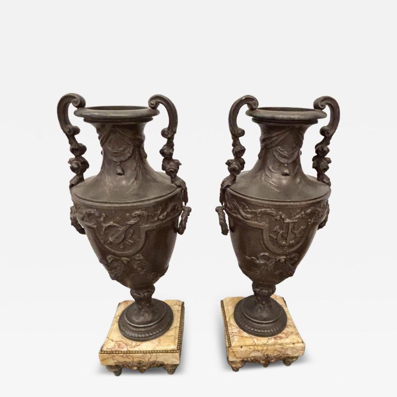 Pair of French Victorian metal urns