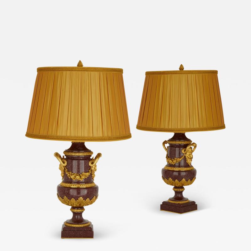 Pair of French antique gilt bronze and porphyry lamps