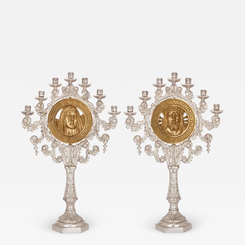 Pair of French gilt and silvered bronze candelabra depicting Jesus and Madonna