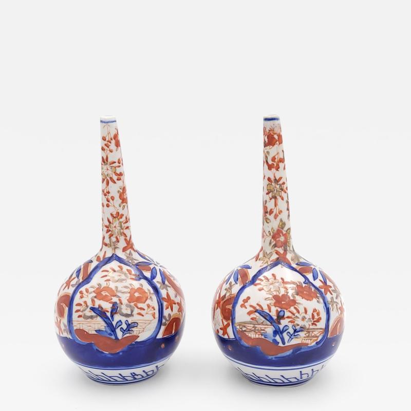 Pair of Imari Bottles or Stick Neck Vases