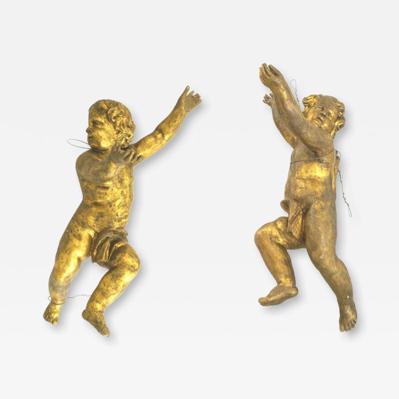 Pair of Italian Rococo Gold Painted Cupids