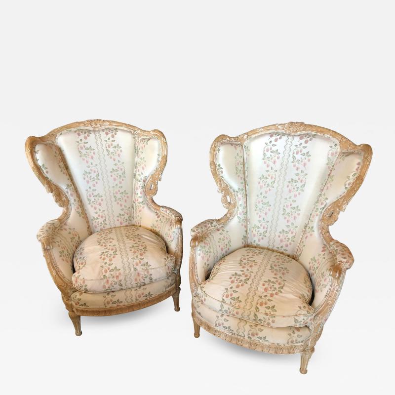Pair of Large Impressive High Back Distressed Carved Framed Wing Back Armchairs