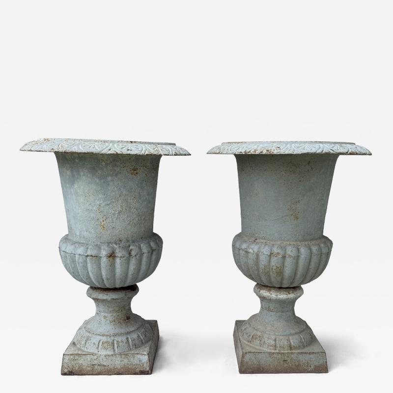 Pair of Late 19th Century Medici Cast Iron Urns in a Distressed Grey Patina
