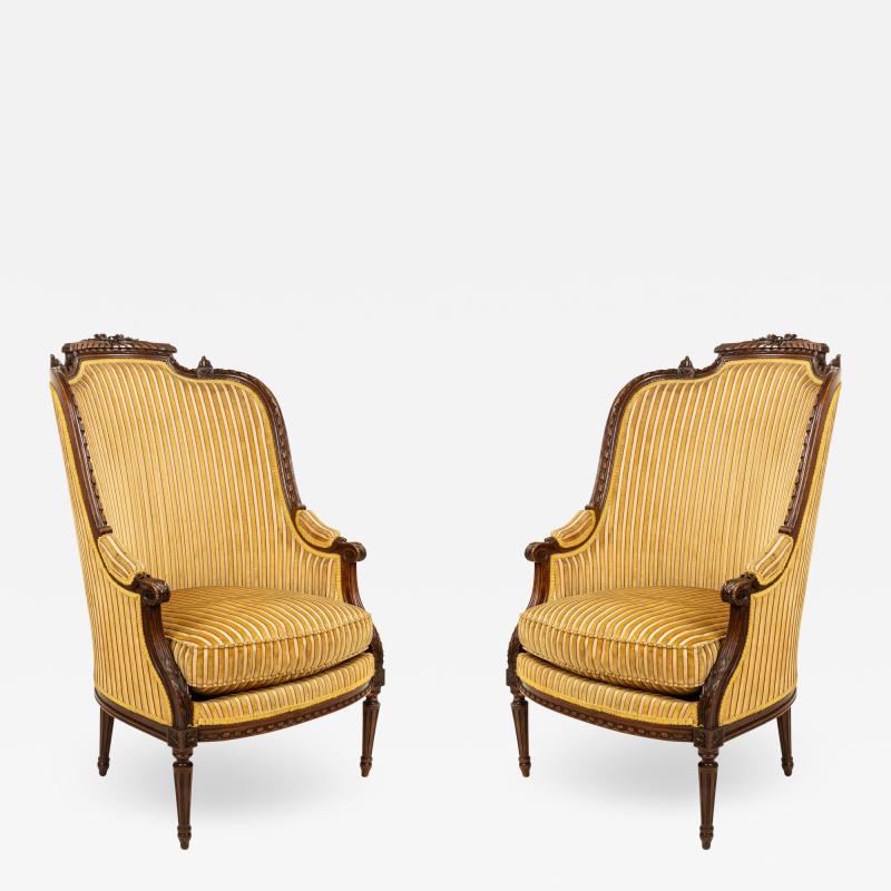 Pair of Louis XVI Walnut Berga Arm Chairs