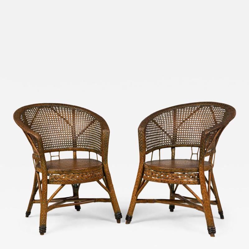 Pair of Mid Century American Wicker Cane Pull Up Armchairs