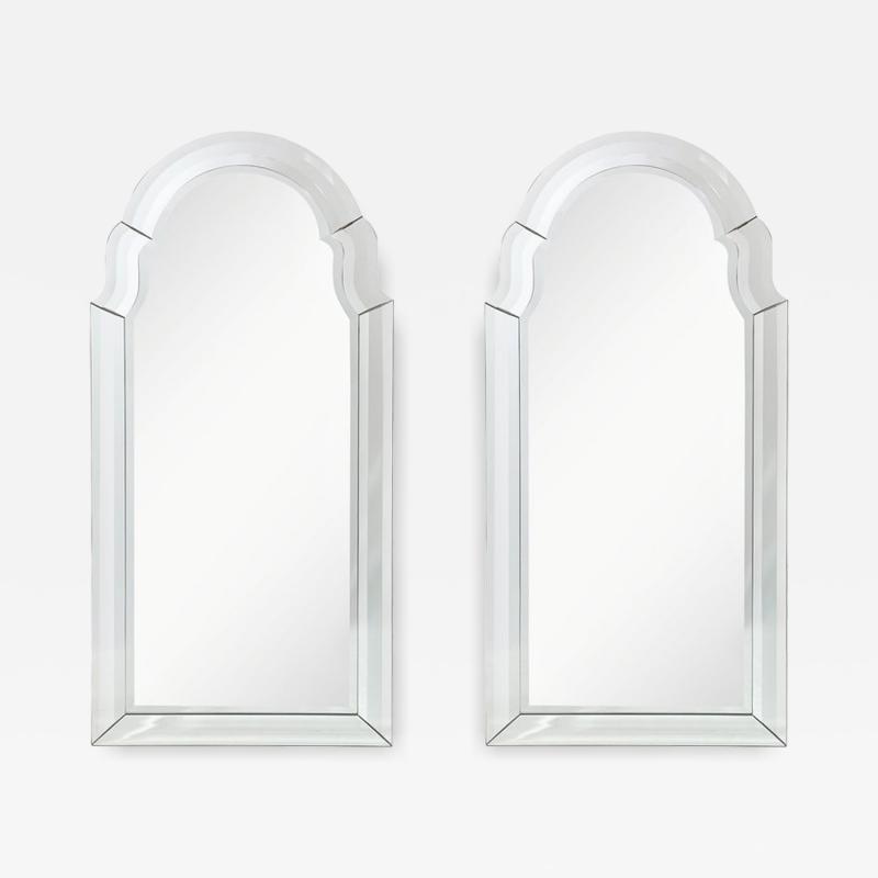 Pair of Mid Century Modernist Serifed Arch Form Mirrors with Beveled Detailing