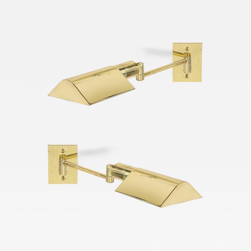 Pair of Mid Century Modernist Swing Arm Articulating Sconces in Polished Brass