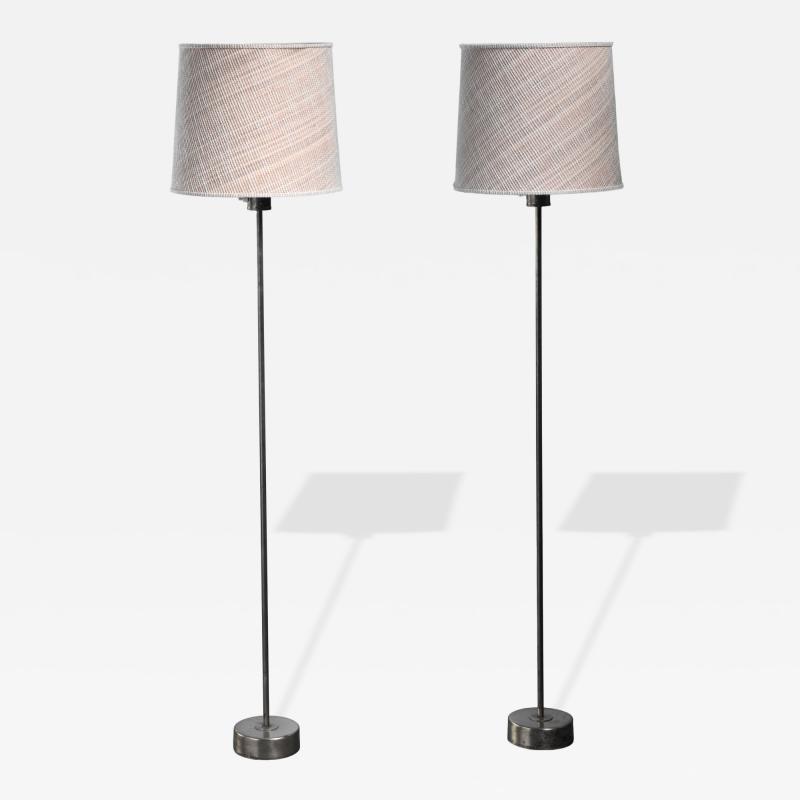 Pair of Modern brass floor lamps