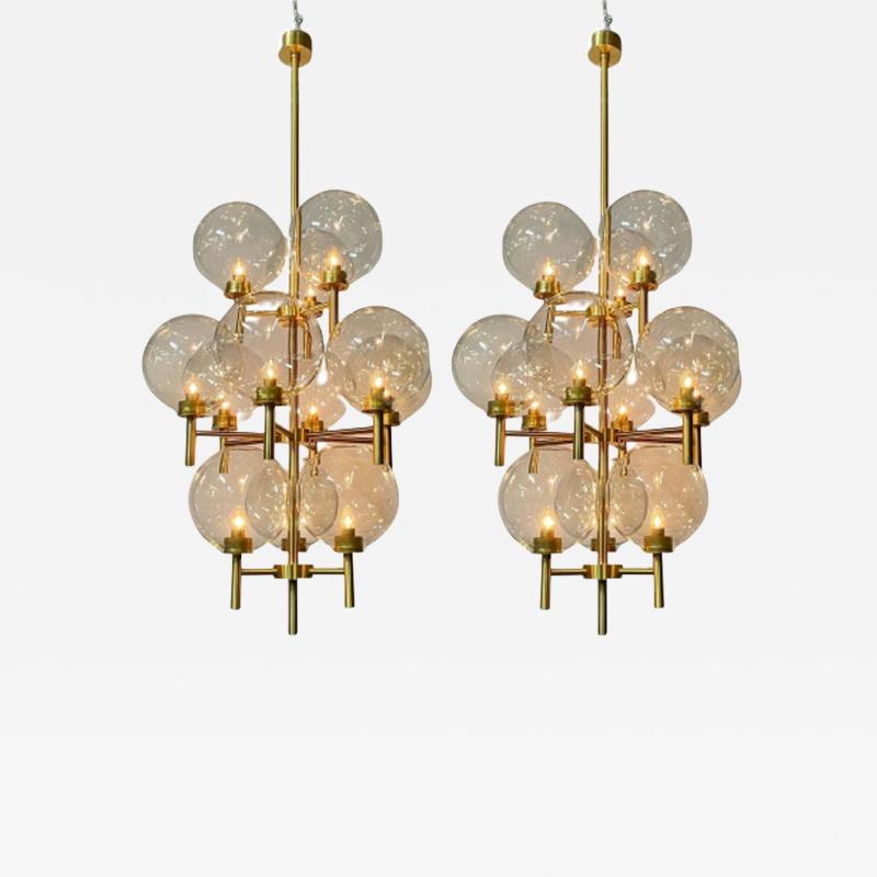 Pair of Monumental Mid Century Modern Style Chandeliers in Amber Glass and Brass
