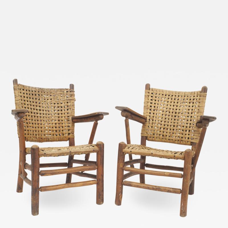Pair of Old Hickory Woven Pine Arm Chairs