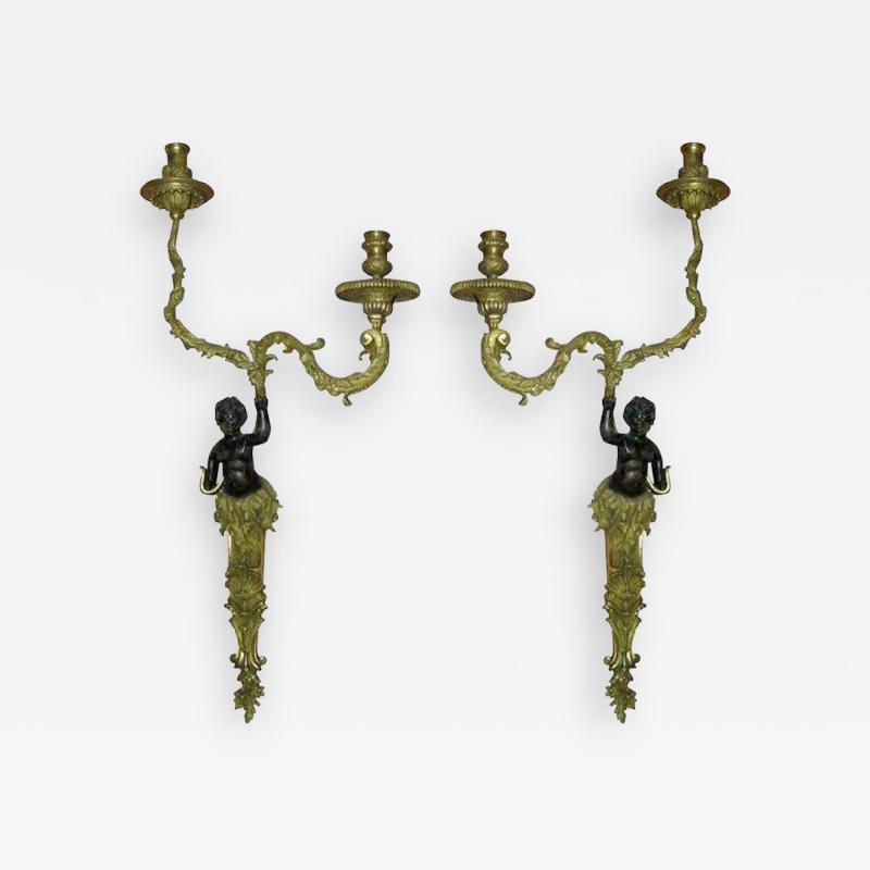 Pair of Regence Bronze Putti Sconces