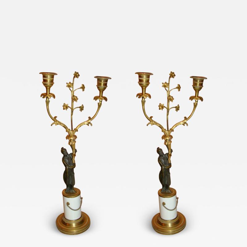 Pair of Regency Figural Candlesticks