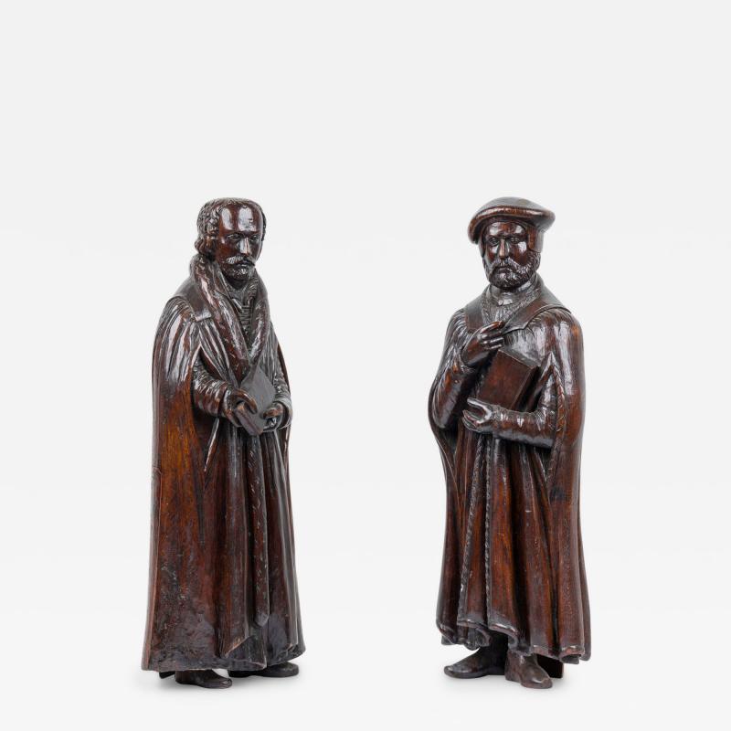 Pair of Renaissance Walnut Scholarly Figures