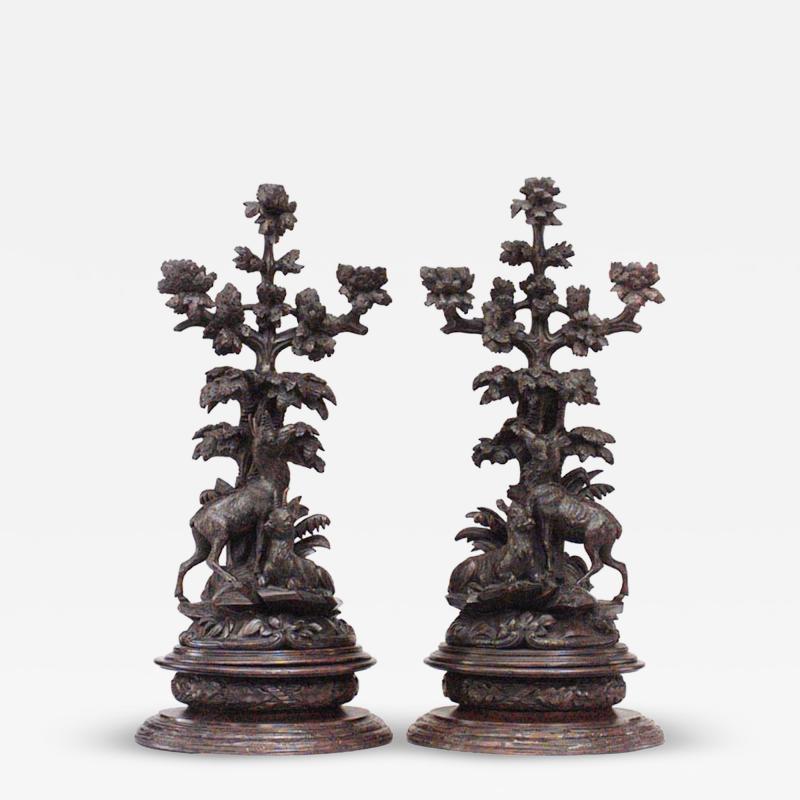 Pair of Rustic Black Forest Carved Walnut Candelabras