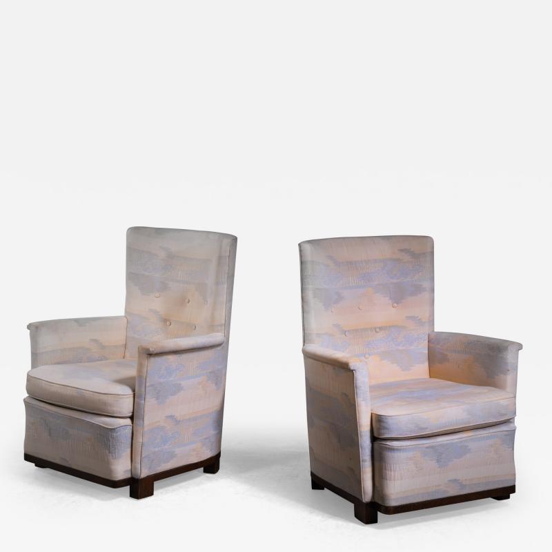 Pair of Scandinavian Modern highback lounge chairs Finland