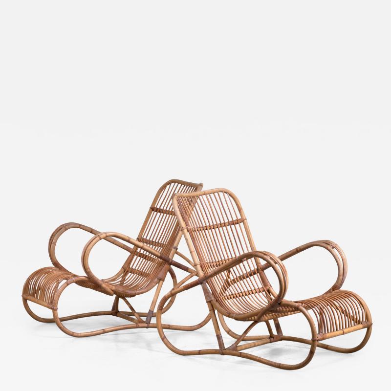 Pair of Scandinavian Modern rattan lounge chairs