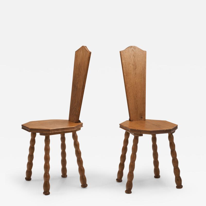 Pair of Sculptural Patinated Oak Spinning Chairs Europe ca Early 20th Century